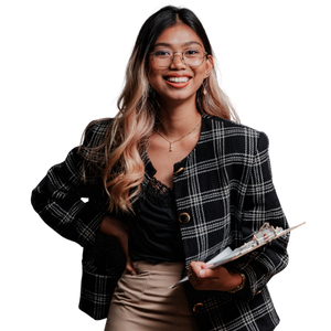 A paid social specialist managing ad campaigns across LinkedIn, Instagram, and Facebook, with analytics dashboards displayed on multiple screens.