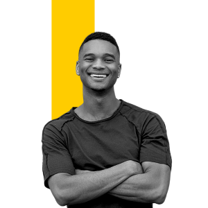 A PPC specialist analyzing Google Ads performance on a laptop with campaign dashboards and metrics visible.