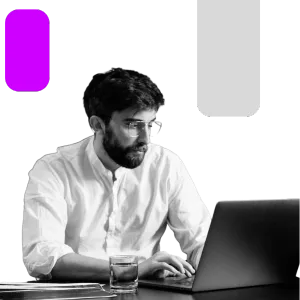 A research analyst reviewing customer insights, market trends, and brand perception data on charts and reports.